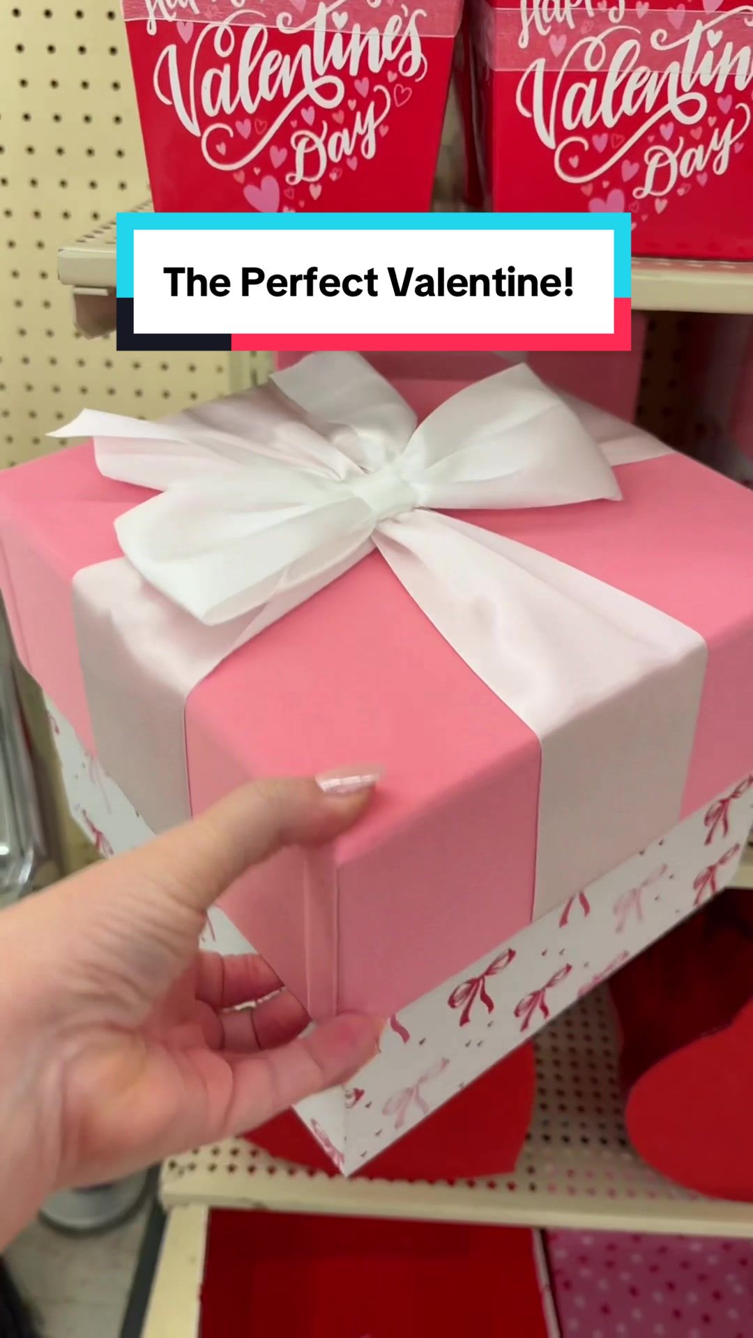 TikTok post by @julieswreathboutique for Hobby Lobby. Caption reads: Come shopping with me in Hobby Lobby’s Valentine....