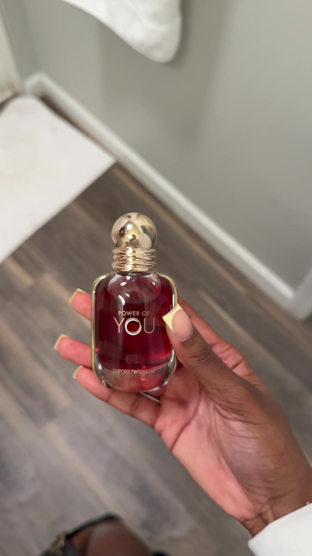 TikTok post by @amourcourtney for Her Campus. Caption reads: Thank you @hercampus & Armani for the gift!....