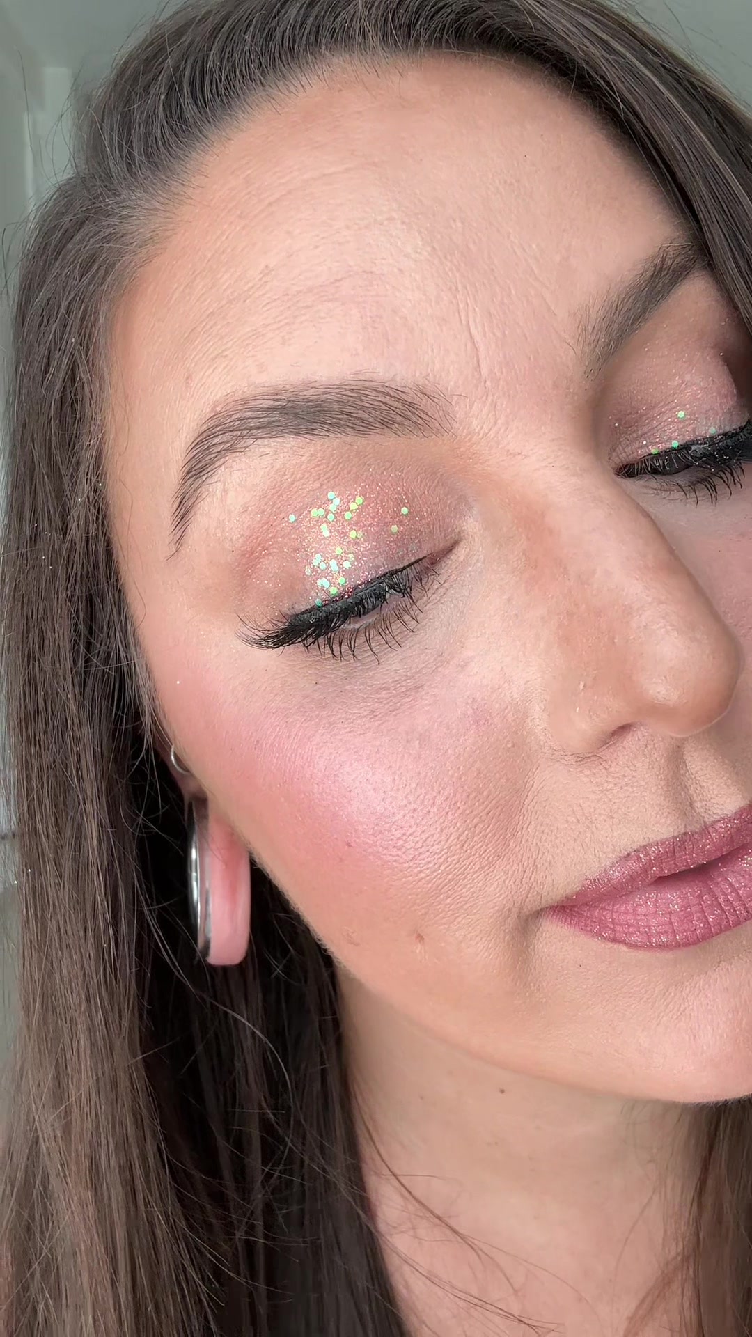TikTok post by @kristinadoesmuah for Kara Beauty. Caption reads: Smother my body in this glitter ✨ 🪩 @Kara Beauty....