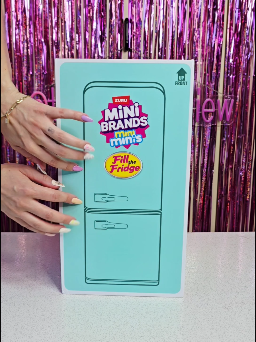 TikTok post by @tanjastoysreview for Zuru Toys. Caption reads: [AD] 🧊 #asmr Unboxing Zuru Mini Brands mini minis....