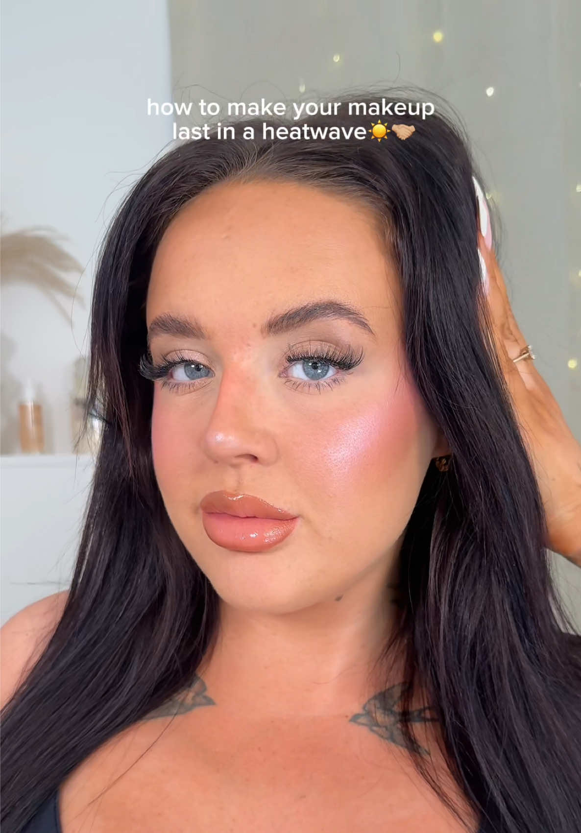 TikTok post by @sophieswannickk for HNB Cosmetics. Caption reads: Hot weather 🤝 @HNB Cosmetics setting spray....