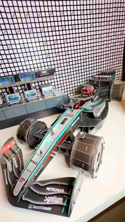 Instagram post by @joshua_cubed for Spin Master. Caption reads: The Mercedes - AMG Petronas F1 Car made of paper!?....