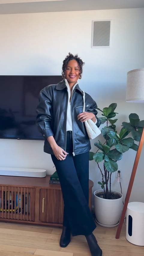 Instagram post by @eiryn.her for Quince. Caption reads: NYC errands fit powered by @onequince x....