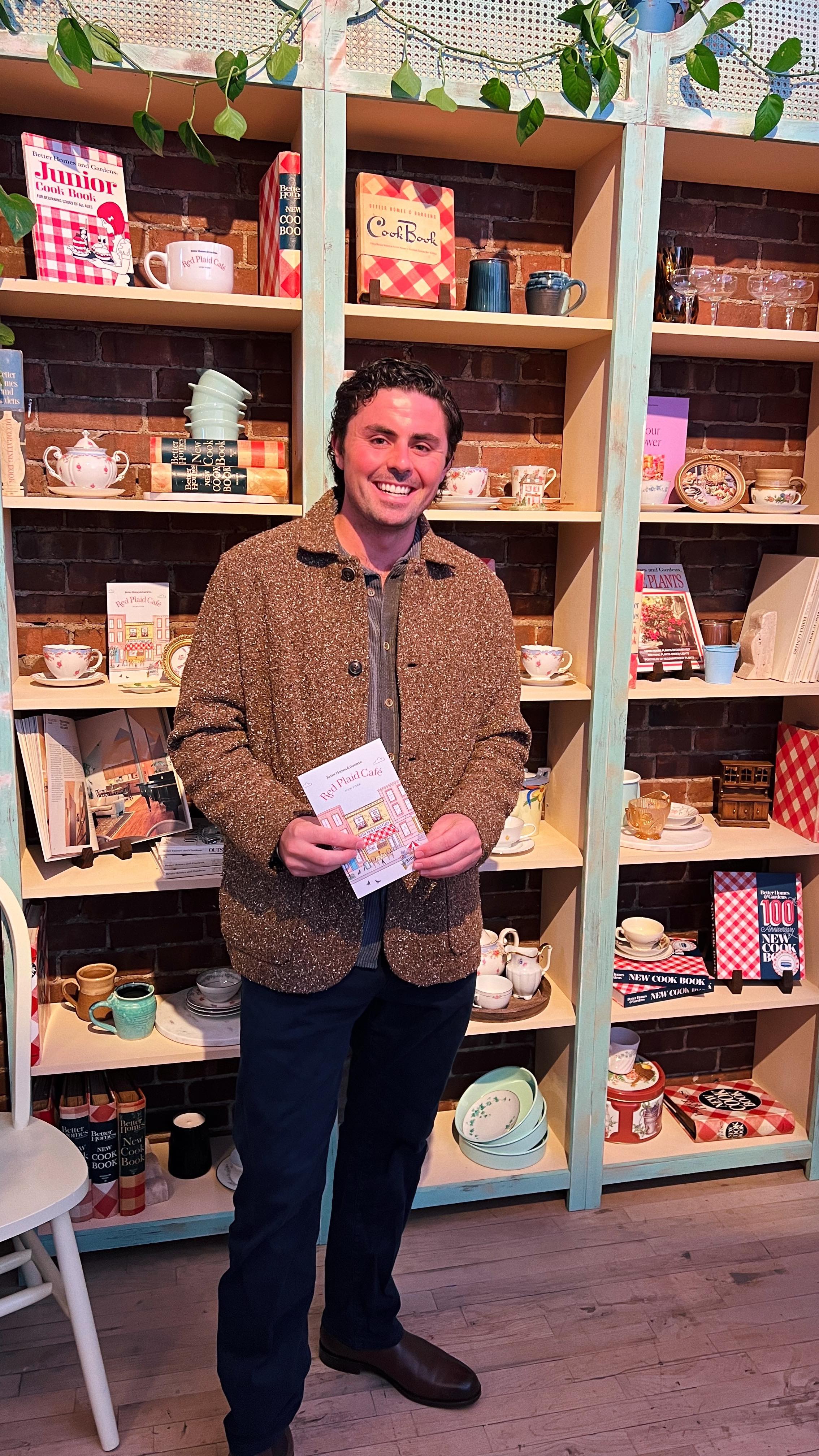 Instagram post by @kdmkitchen for Better Homes & Gardens. Caption reads: The most cozy Red Plaid Cafe....