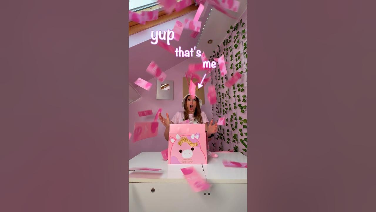 YouTube post by @rhia.official for Squishmallows. Caption reads: [ASMR] SQUISHMALLOWS SENT ME A MYSTERY BOX FOR....