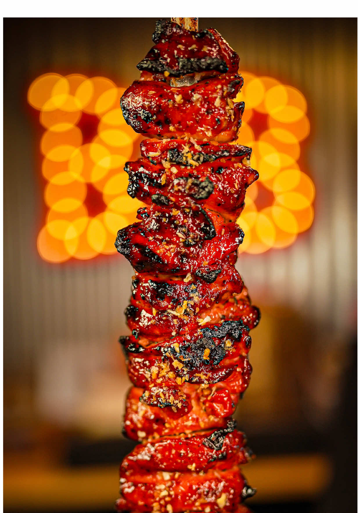 TikTok post by @tfti.bbq for Char-griller. Caption reads: Filipino BBQ Chicken Skewers 🇵🇭 One of my....