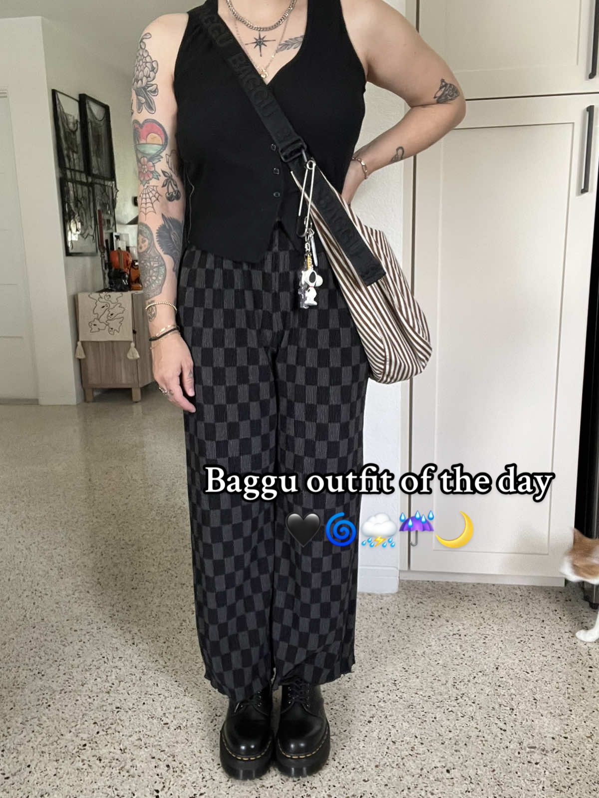TikTok post by @sopookyncute for BAGGU. Caption reads: [...] Shoes - Doc Martens Bag - Baggu large stripe....