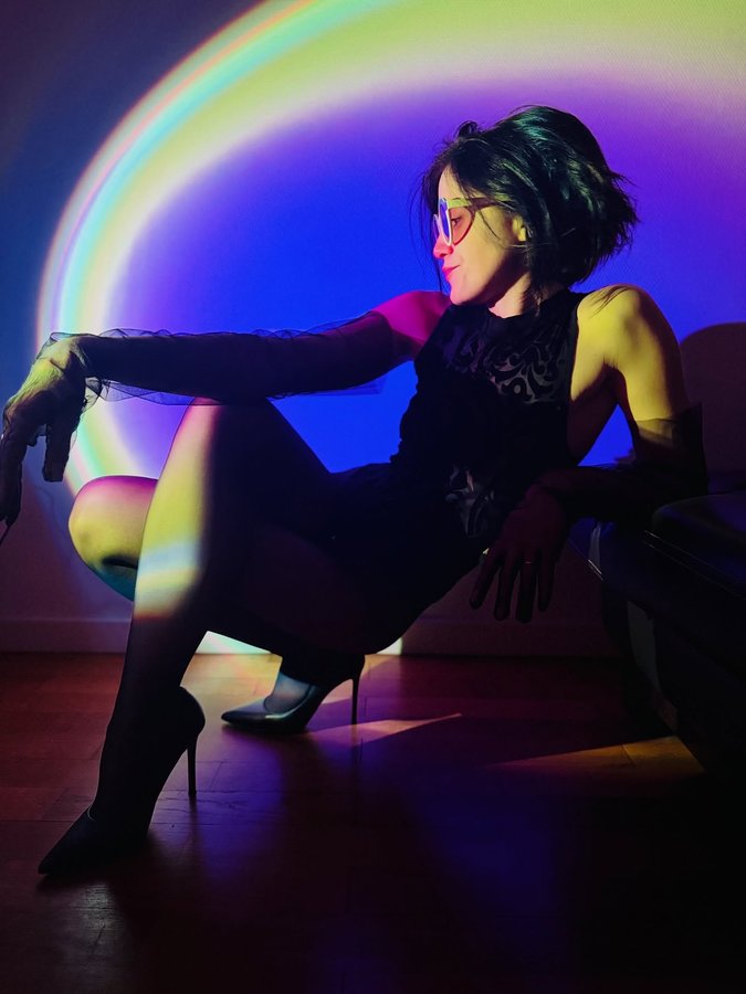 Instagram post by @madamelaurence_ for Wolford. Caption reads: [...] attitude, and the timeless allure of....