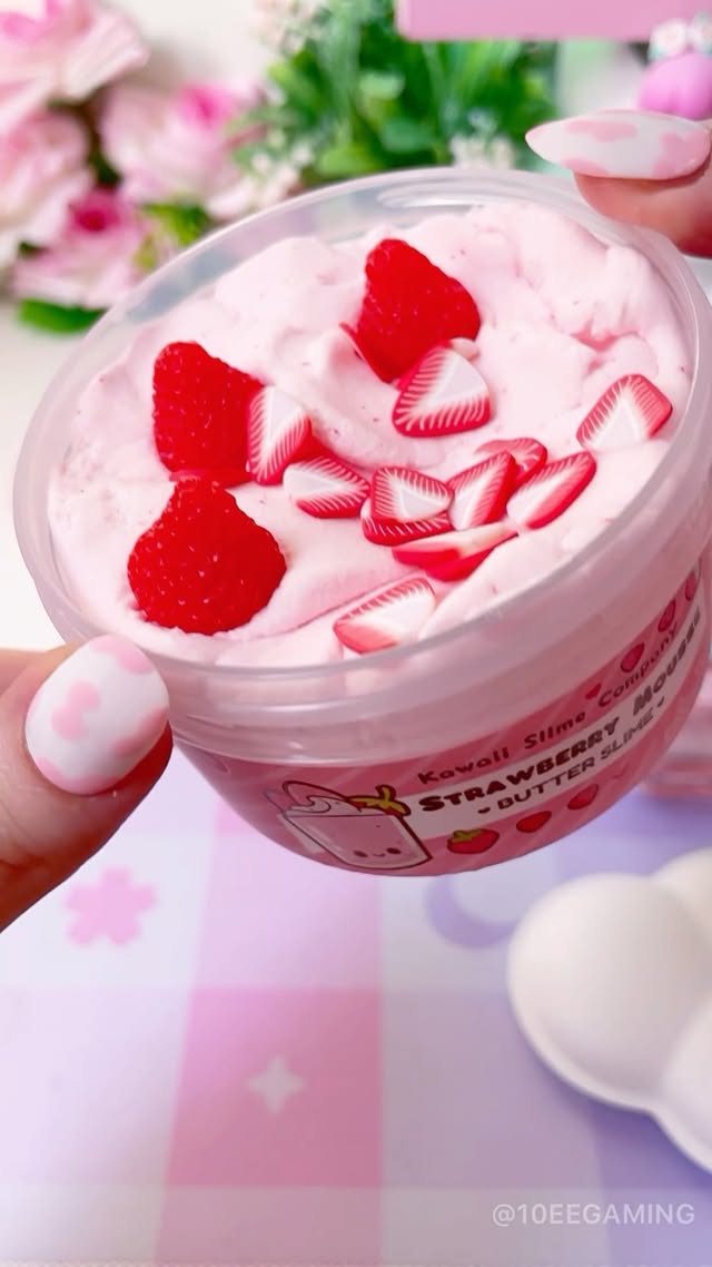 Instagram post by @10eegaming for Kawaii Slime Company. Caption reads: 🍓 Strawberry Mousse Slime 🍓 Unboxing another....
