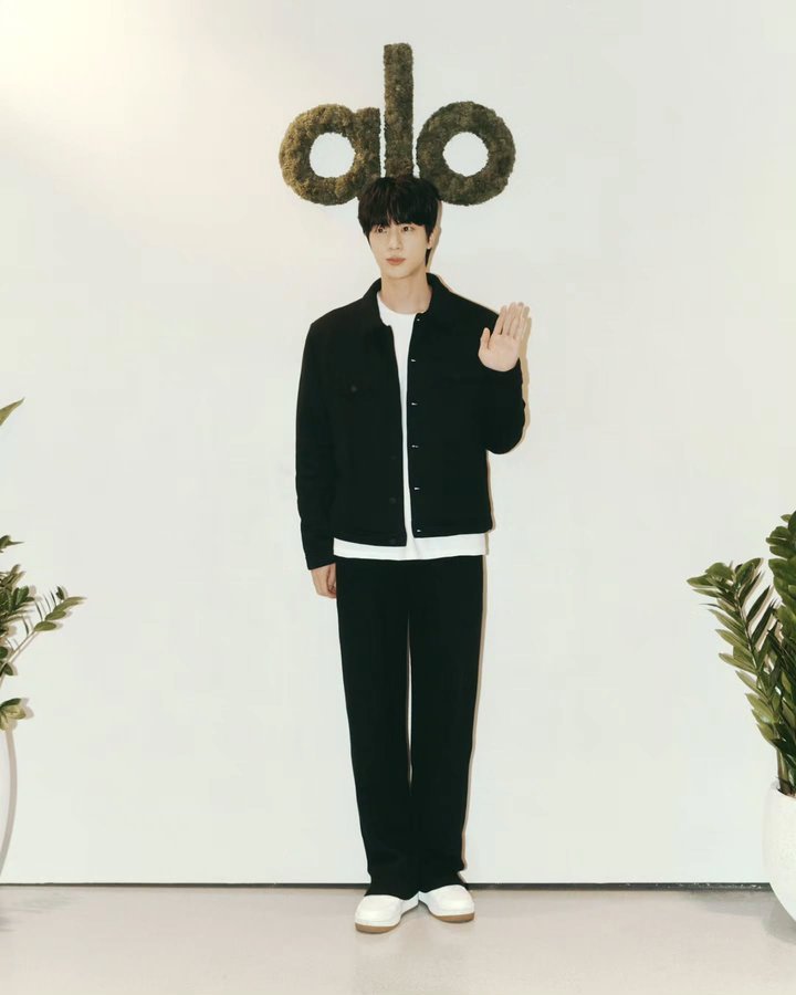 Instagram post by @jin for Alo Yoga. Caption reads: #광고 Welcome to Seoul @alo @aloseoul.