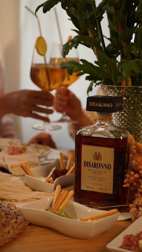 Instagram post by @ruxandraioana for Disaronno. Caption reads: #PUBLICITÉ | Paid partnership with....