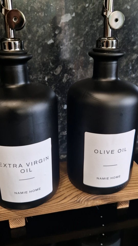 Instagram post by @ournewhome2023 for NAMIE HOME. Caption reads: Ad| I love these oil dispensers from @namiehome.....