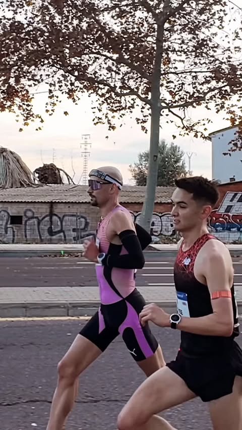 Instagram post by @hendrik_pfeiffer for COROS. Caption reads: Running side by side, two exceptional COROS....