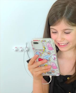 Instagram post by @allegra_maia_14 for Elago. Caption reads: Phone cover 📲 and bunny cable case 🐰 @elago.it....