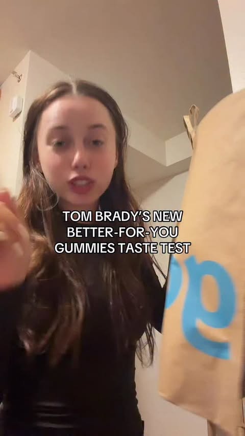 Instagram post by @kimperetz for Gopuff. Caption reads: Taste testing the Tom Brady x Gopuff GOAT gummies✨....