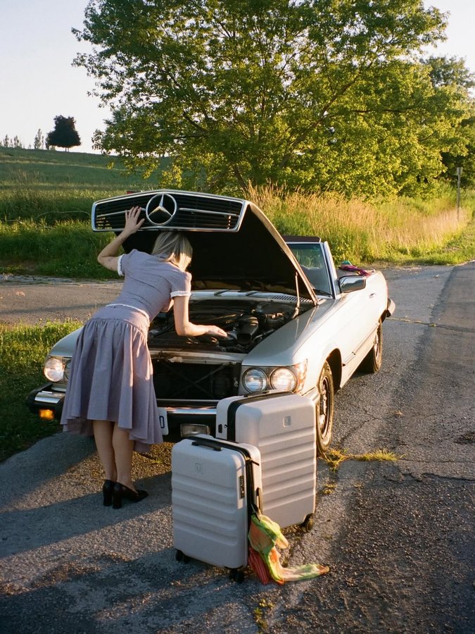 Instagram post by @briidgetbrown for Antler. Caption reads: just me and my baggage @antlerofficial #ad.
