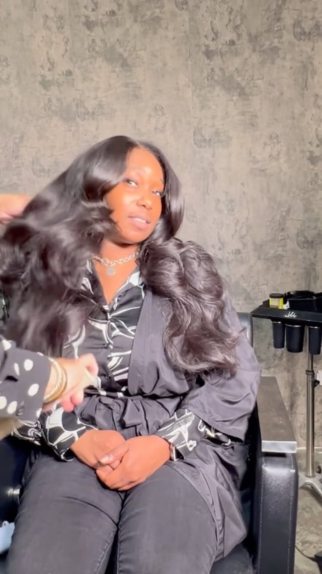 Instagram post by @stylesbyhim for D Hair Boutique. Caption reads: [...] x Layers using 22in slight wave from....