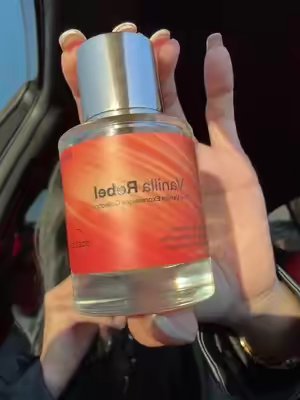 TikTok post by @fernandaapartida for Dossier Perfume. Caption reads: @Dossier Perfume VANILLA REBEL ✨ #TikTokShop.
