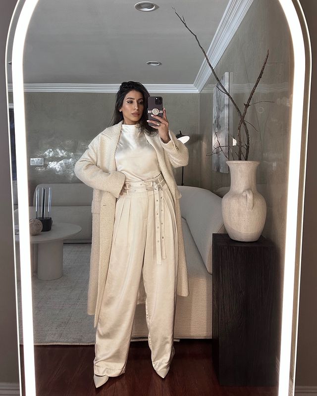 Instagram post by @aditioberoimalhotra for The Noli Shop. Caption reads: [...] winter white look 💭 from the....
