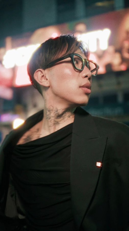 Instagram post by @johndominicrai for Redken. Caption reads: #Collaboration | A hair glossing serum that....