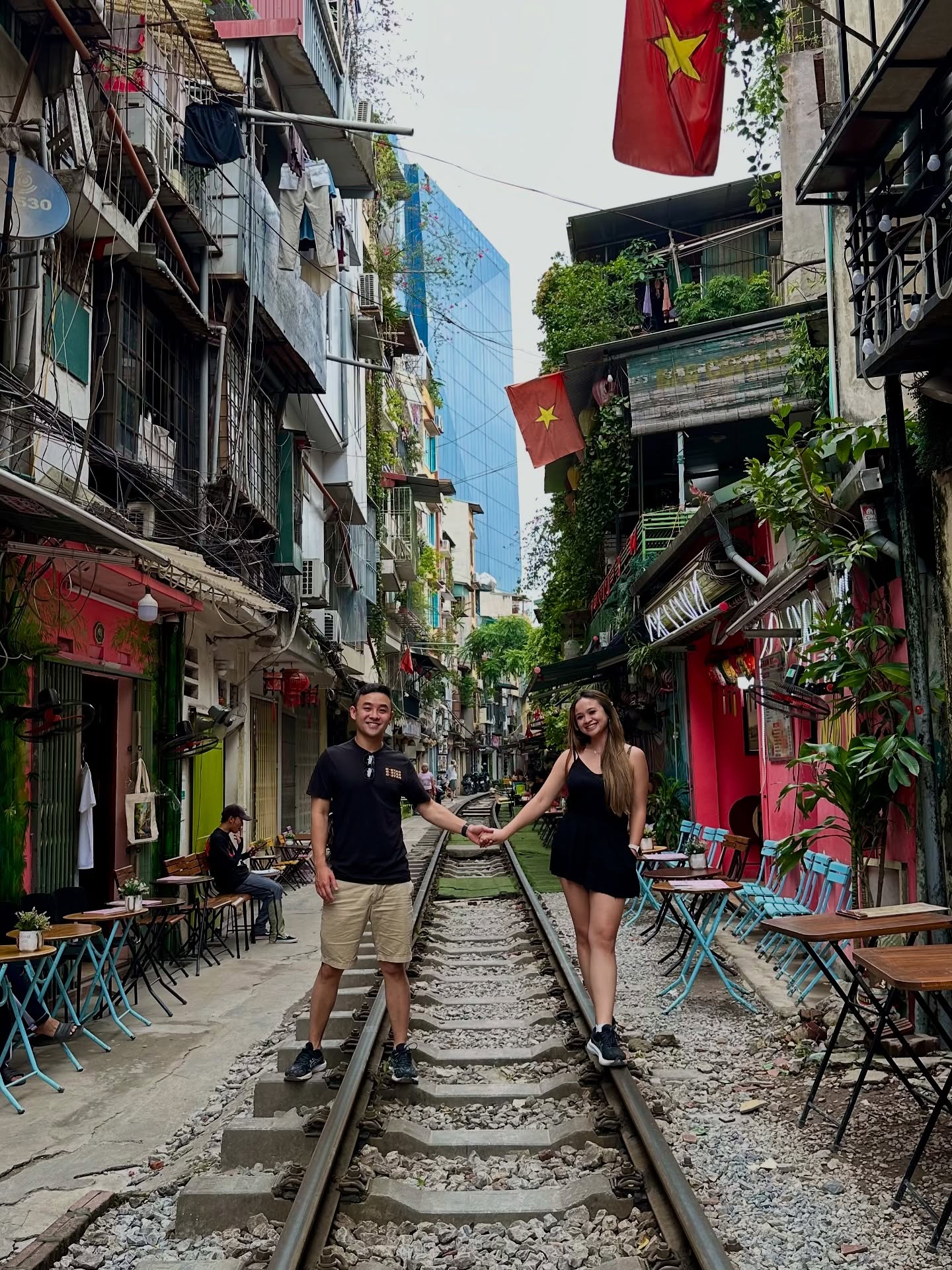 Instagram post by @bucketlist.explores for GetYourGuide. Caption reads: This is HANOI 🛵🏮🇻🇳
➡️ SWIPE to experience the....