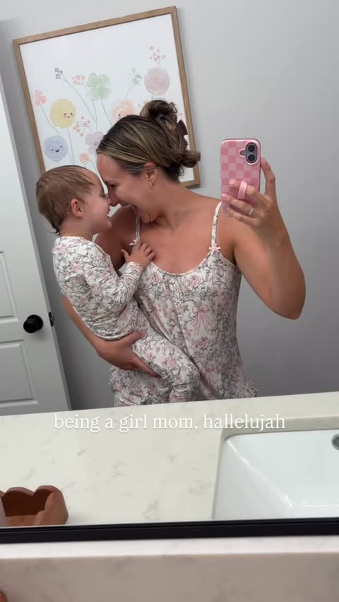 Instagram post by @christine.t.matthews for Posh Peanut. Caption reads: & matching in our Posh Peanut pajamas, hallelujah....