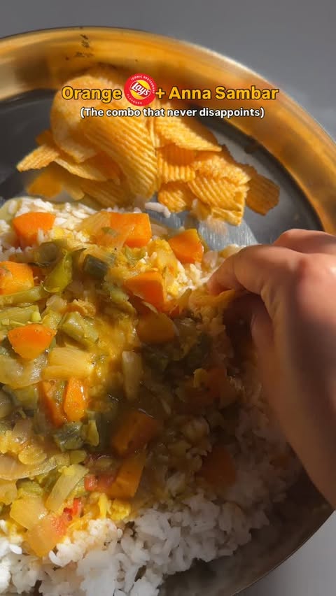 Instagram post by @jollydelicacy for Lay's. Caption reads: Try it if you haven’t!!

#sambar #meals #lays.