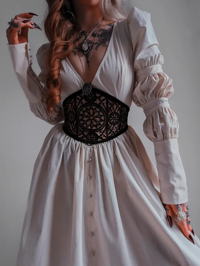 Instagram post by @kllsym for Petals and Poison. Caption reads: Introducing the October Dress from....