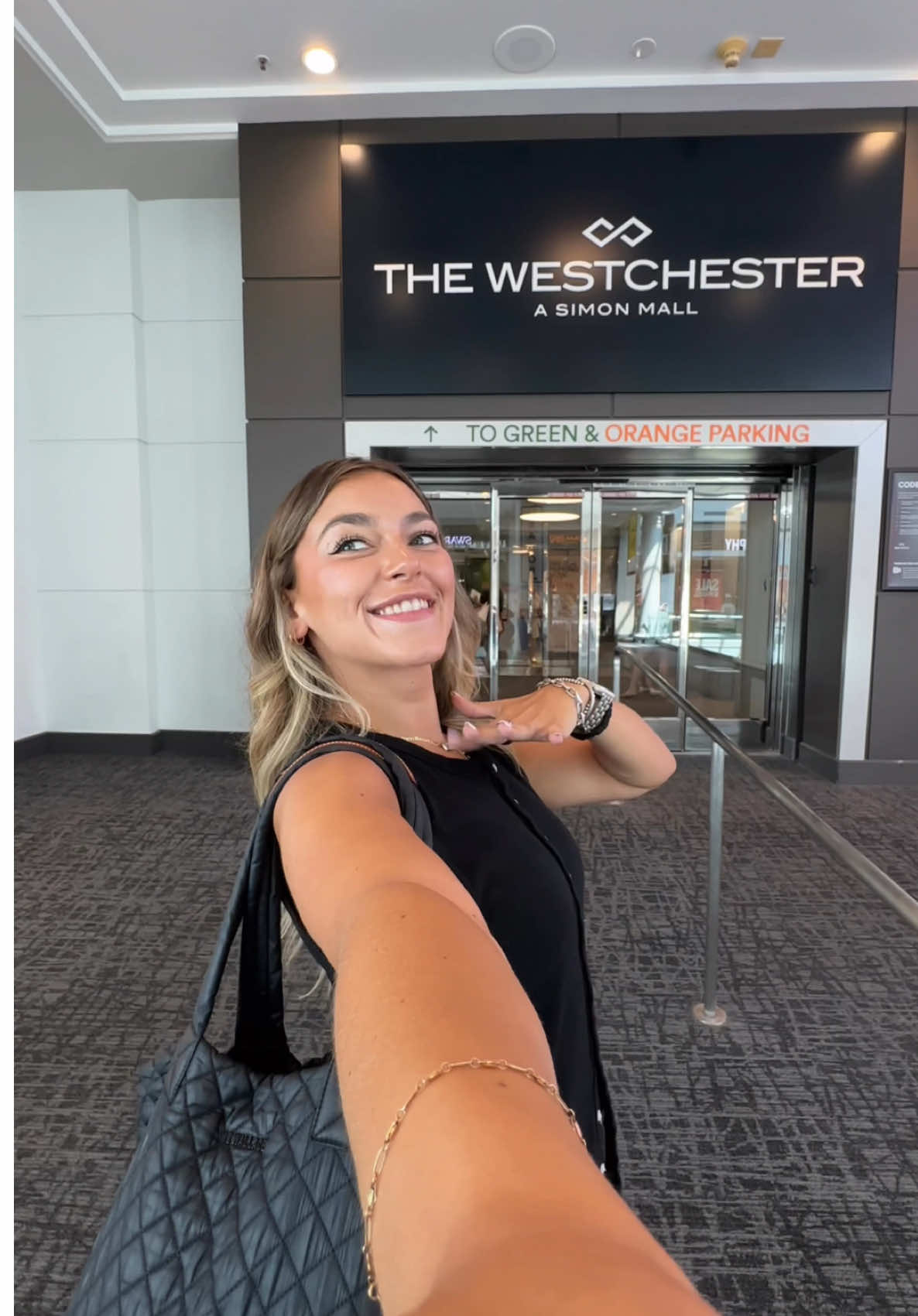 TikTok post by @carrrlyym for The Mall Luxury Outlets. Caption reads: HEY WESTCHESTER PEEPS 👋🏼 some exciting news…. I....