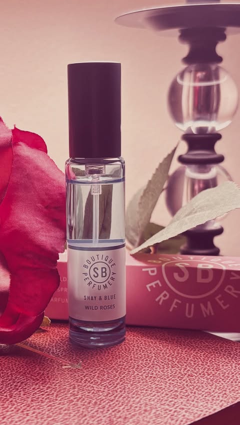 Instagram post by @misskmichael for Shay & Blue. Caption reads: #wildroses #shayandblue #rosefragrance #ad #gifted....