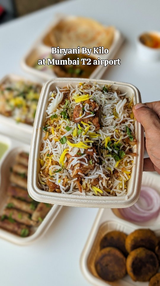 Instagram post by @saranshgoila for Biryani By Kilo. Caption reads: Your next Biryani at the airport could be a feast!....