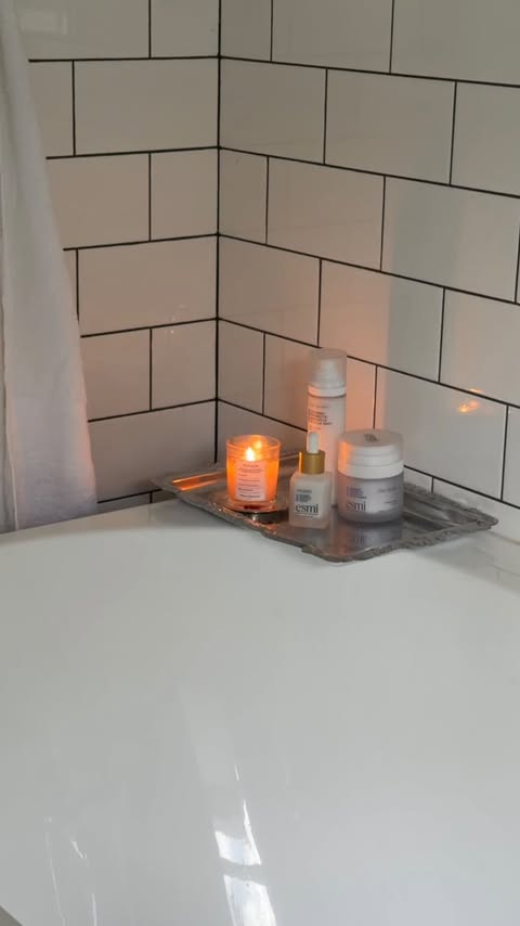 Instagram post by @emilyquach for esmi Skin Minerals. Caption reads: My post AFW routine: bath, tea and....