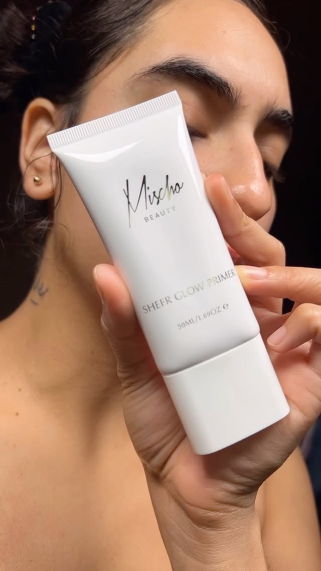 Instagram post by @honeycdrip for Dew of the Gods. Caption reads: [...] @mischobeauty sheer glow primer....