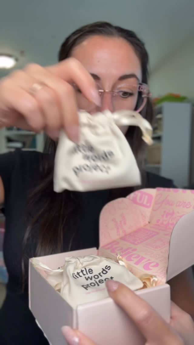 Instagram post by @hewoitsange for Little Words Project. Caption reads: [...] unboxing 😭

These bracelets from....