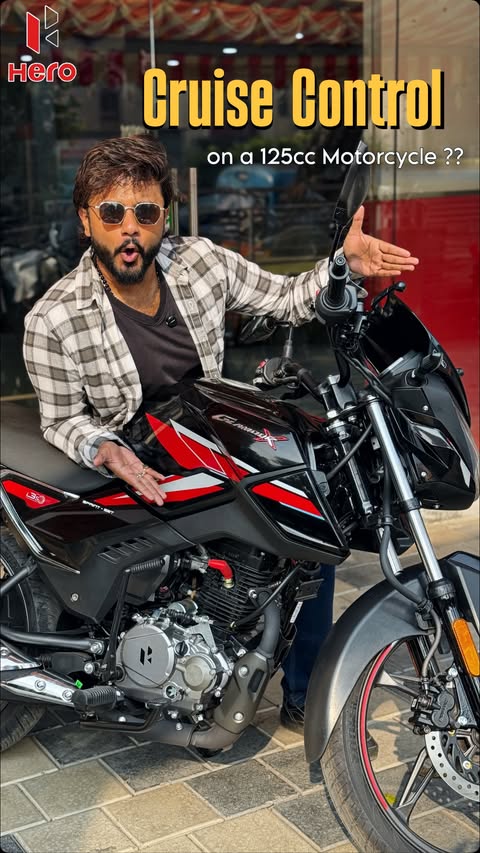 Instagram post by @theconfusedbox for Hero MotoCorp. Caption reads: Cruise control on a 125cc motorcycle??? Meet the....