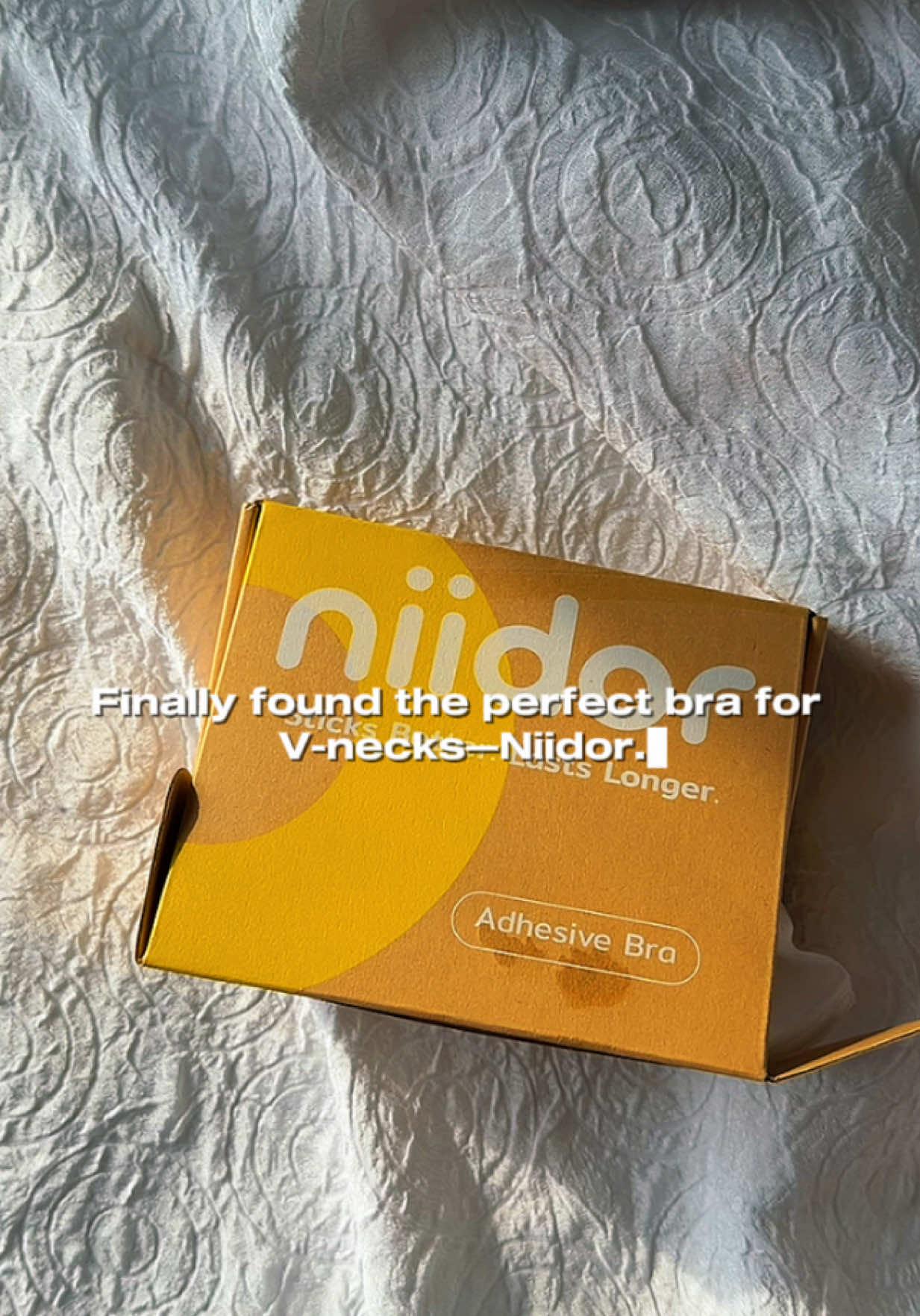 TikTok post by @prettypinkkqueenn for Niidor. Caption reads: Found my new V-neck essential—thank you, @Niidor....