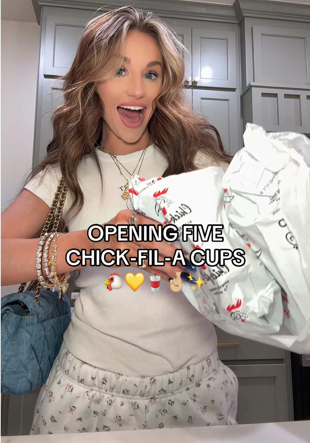 TikTok post by @sydneyrenayeverhart for Chick-fil-A. Caption reads: AND THE GOLDEN CUP GOES TO…🤞🏼🐔✨ @Chick-fil-A....