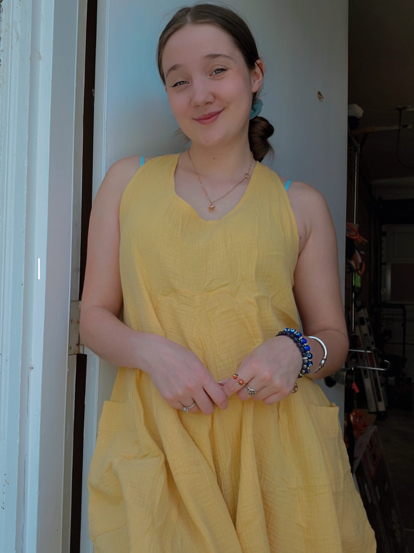 TikTok post by @sableheart72492 for Songling Fashion. Caption reads: romanticizing my summer one sundress at a time....