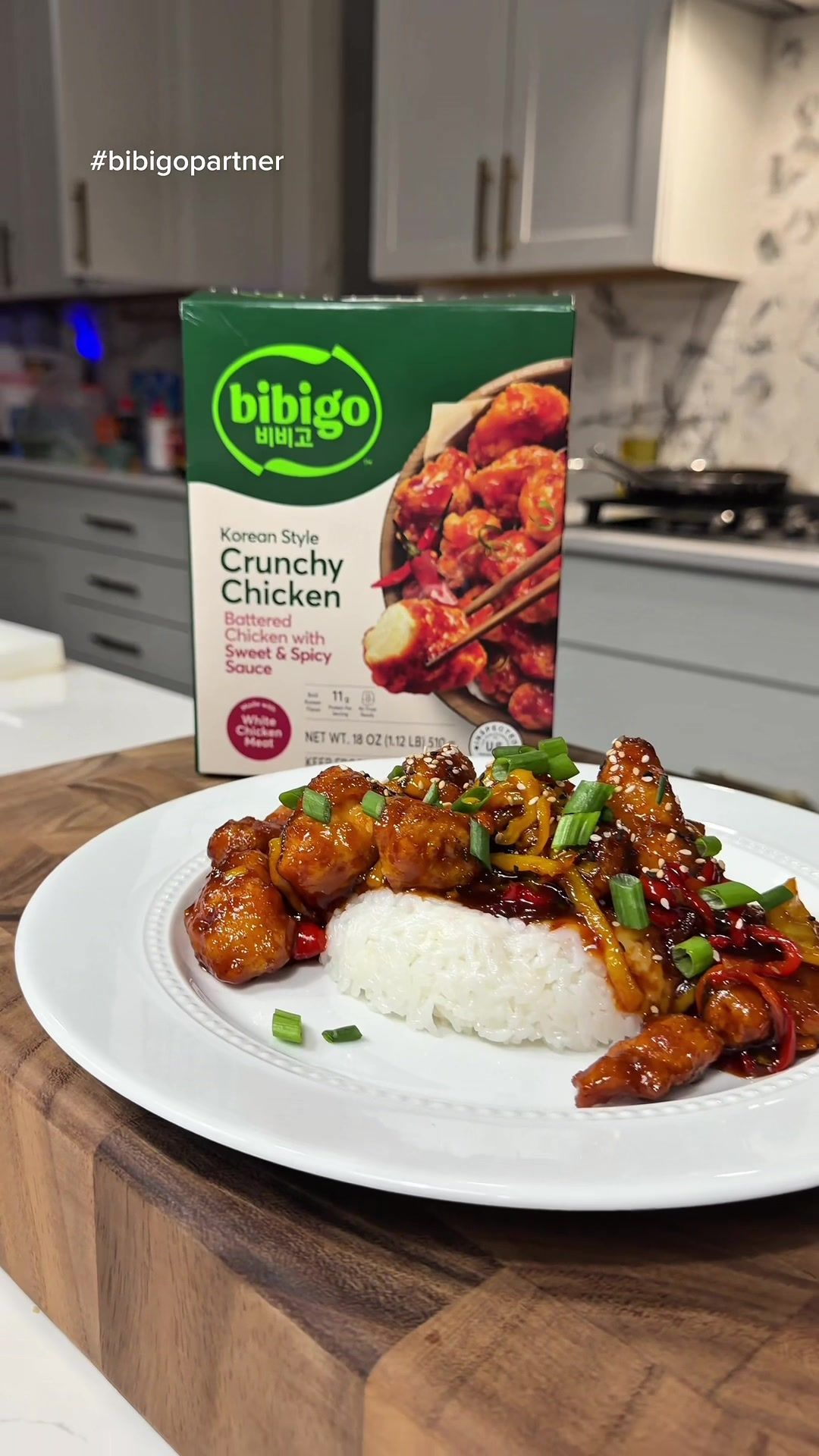 TikTok post by @onestopchop for bibigo USA. Caption reads: [...] #bibigoforit moments. #bibigopartner @bibigo....