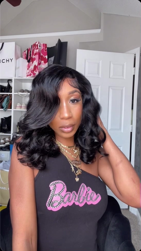 TikTok post by @crownmecutie for Ashimary Hair. Caption reads: This wig is PERFECTION! Zero effort! LINK ON....
