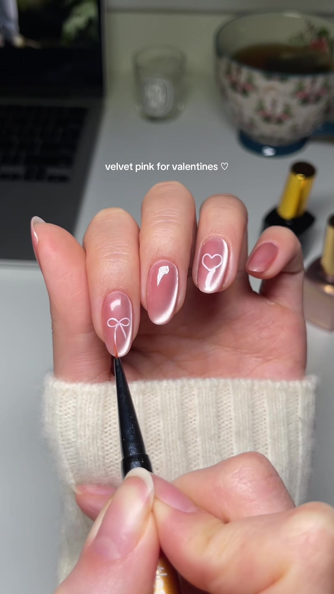TikTok post by @heluviee for Apres Nail. Caption reads: these have my whole heart 🏹💞🎀 using the shade....