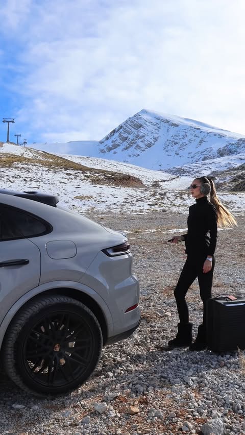 Instagram post by @dominika_rides for Porsche. Caption reads: Mountains, silence, power,
the Porsche Cayenne is....