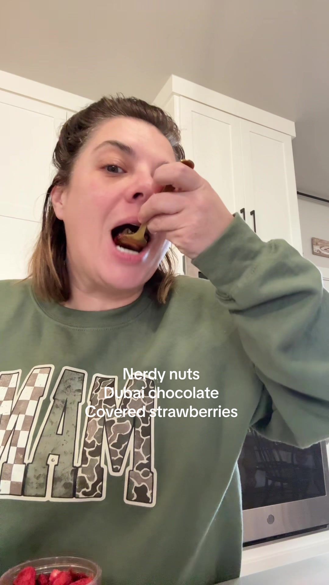 TikTok post by @texasmomma24 for Nerdy Nuts. Caption reads: Chocolate-covered strawberry energy but make it a....