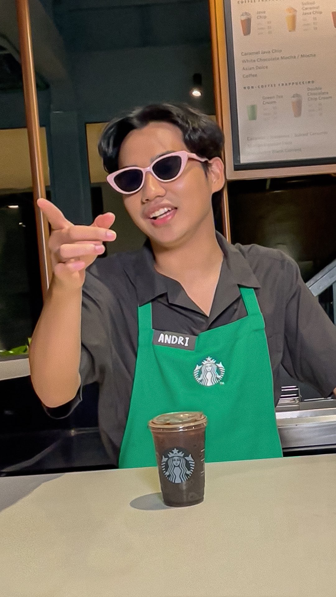 Instagram post by @andriadri__ for Starbucks. Caption reads: POV liat Andri finish & connect minuman customer....