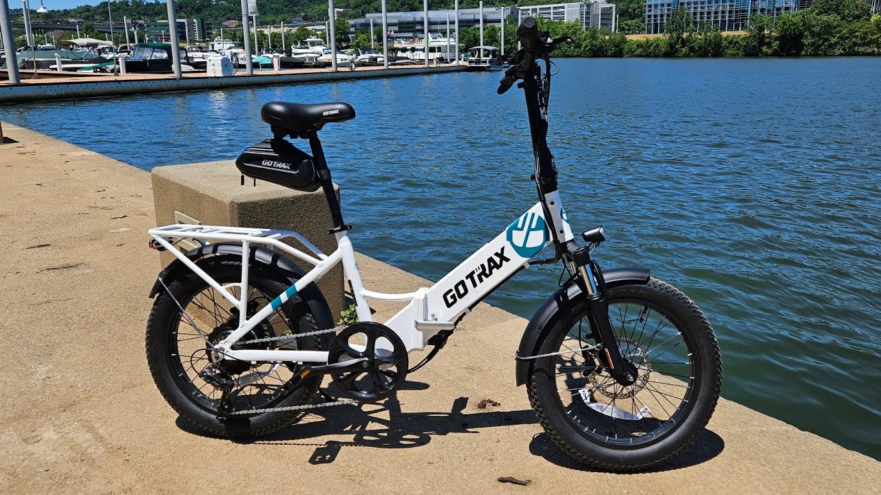 YouTube post by @NNKH2 for Gotrax. Caption reads: Pittsburgh TOUR / GOTRAX F2 E-Bike REVIEW - NNKH.