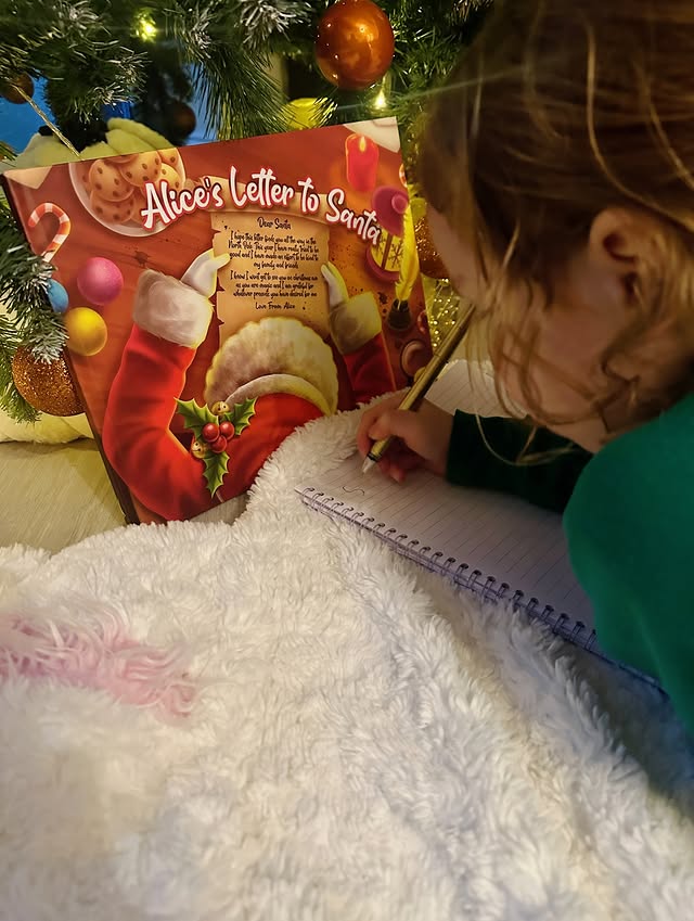 Instagram post by @lifewithaliceandcharlotte for StoryBug. Caption reads: [...] with her Letters to Santa book from....