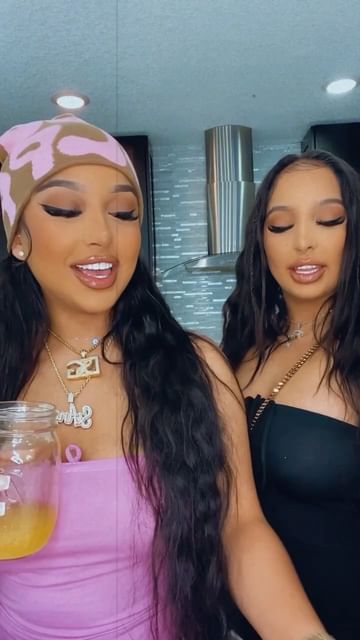 Instagram post by @siangietwins for BOOMBOD. Caption reads: #ad @boombod shots are putting in work! These bods....