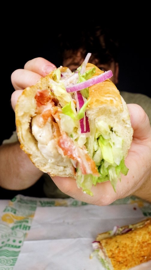 Instagram post by @mukbangmaxwell for Subway. Caption reads: #ad I love me some chicken 🐓and @subwaycanada is....