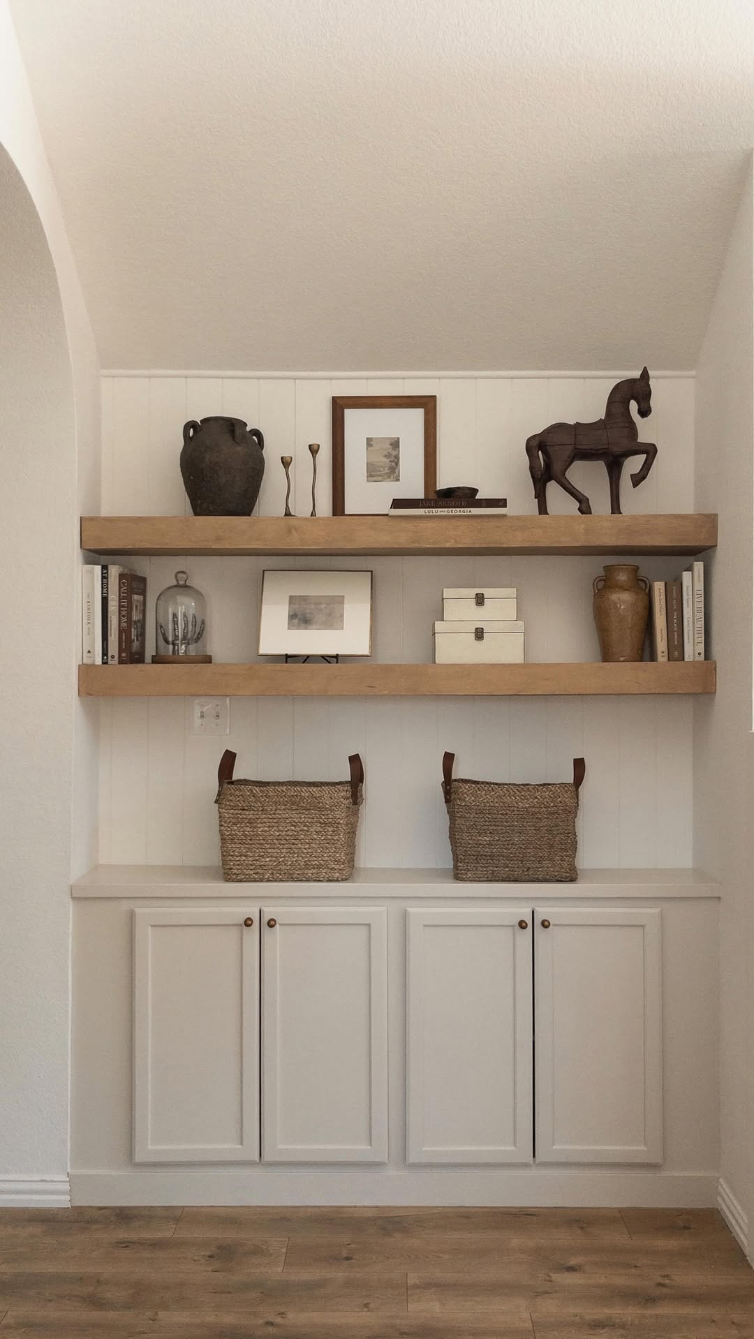 Instagram post by @accordingtomandy for Benjamin Moore. Caption reads: #AD | Let’s give our built-ins a mini makeover....