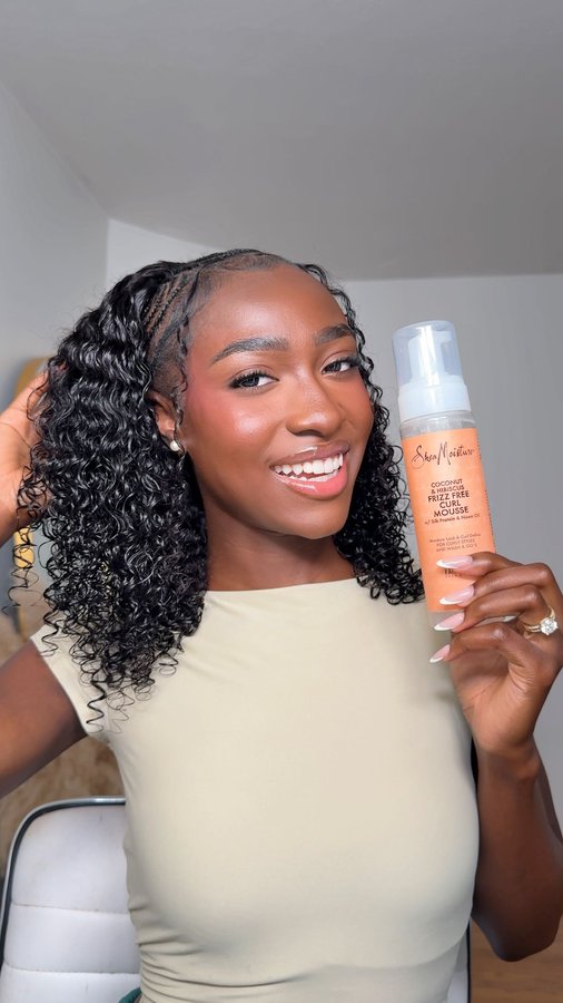 Instagram post by @ginab.xo for Sheamoisture. Caption reads: Curls worthy of the Bravo spotlight, right from....